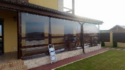 Inchidere terasa cu folie transparenta cu capse si bride